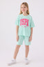 U.S. Polo Assn. Kız Çocuk Bisiklet Yaka Pigment Baskılı Yazlık Regular Fit Mavi Bermuda Takım US1849-C-V2