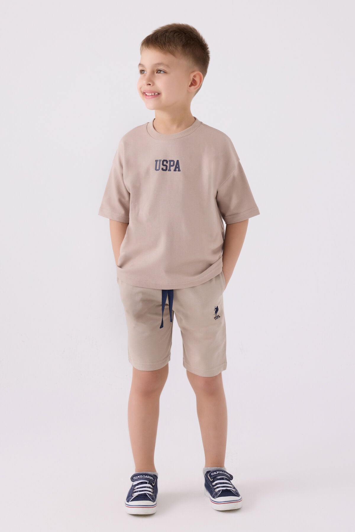 U.S. Polo Assn. Erkek Çocuk Bisiklet Yaka Pigment Baskılı Yazlık Regular Fit Krem Bermuda Takım US1781-C-V4 Ürün ana görseli