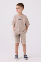 U.S. Polo Assn. Erkek Çocuk Bisiklet Yaka Pigment Baskılı Yazlık Regular Fit Krem Bermuda Takım US1781-C-V4