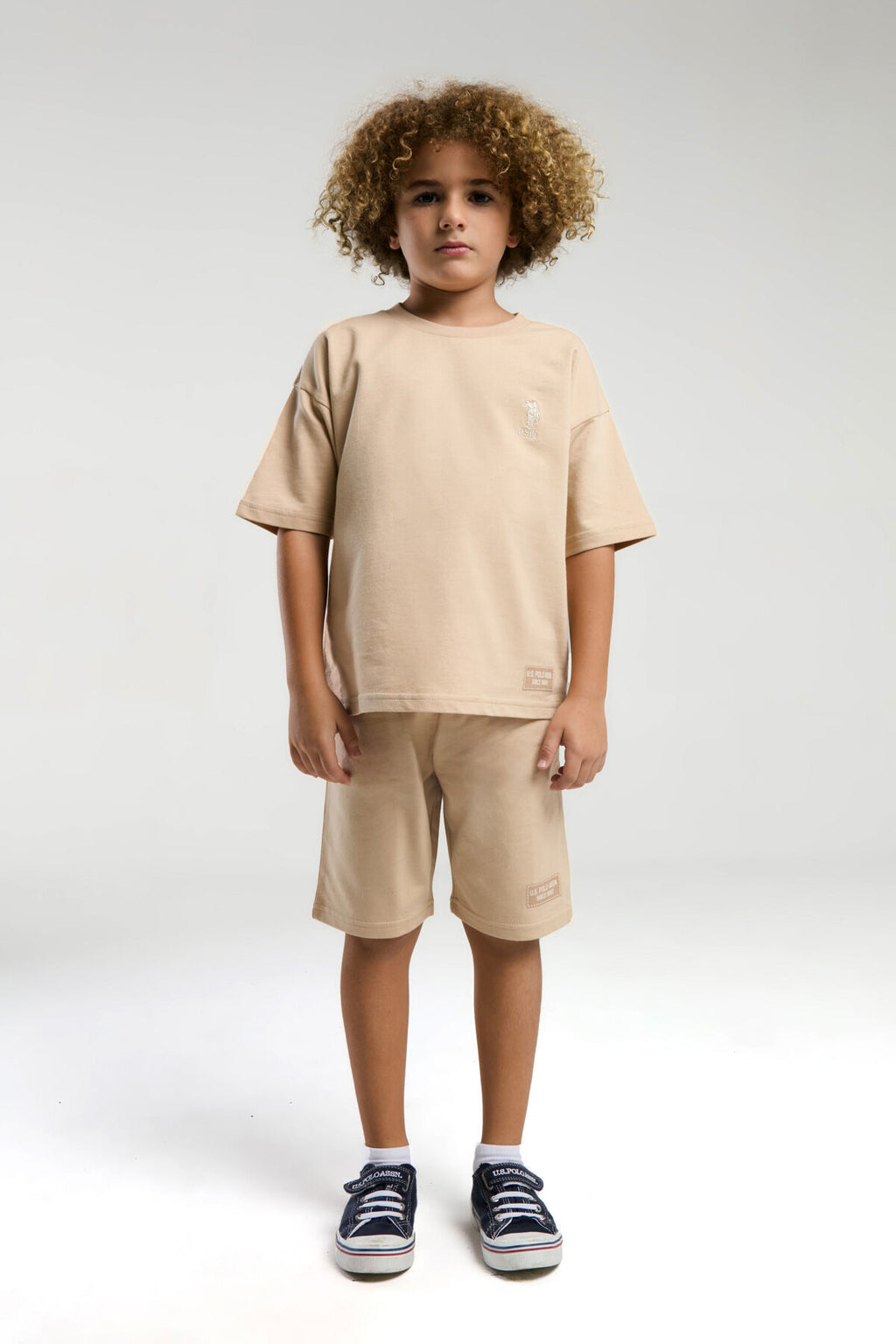 U.S. Polo Assn. Erkek Çocuk Bisiklet Yaka Pigment Baskılı Yazlık Regular Fit Krem Bermuda Takım US2035-C-V3