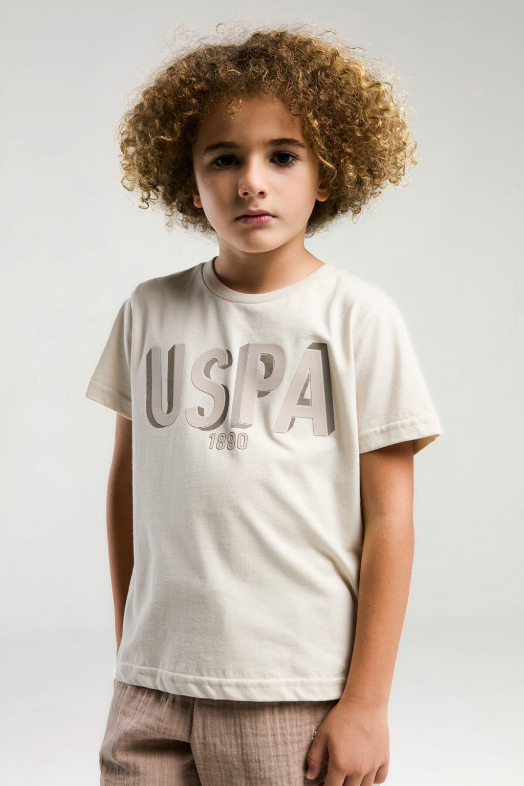 U.S. Polo Assn. Erkek Çocuk Bisiklet Yaka Pigment Baskılı Yazlık Regular Fit Krem Bermuda Takım US2039-C-V2