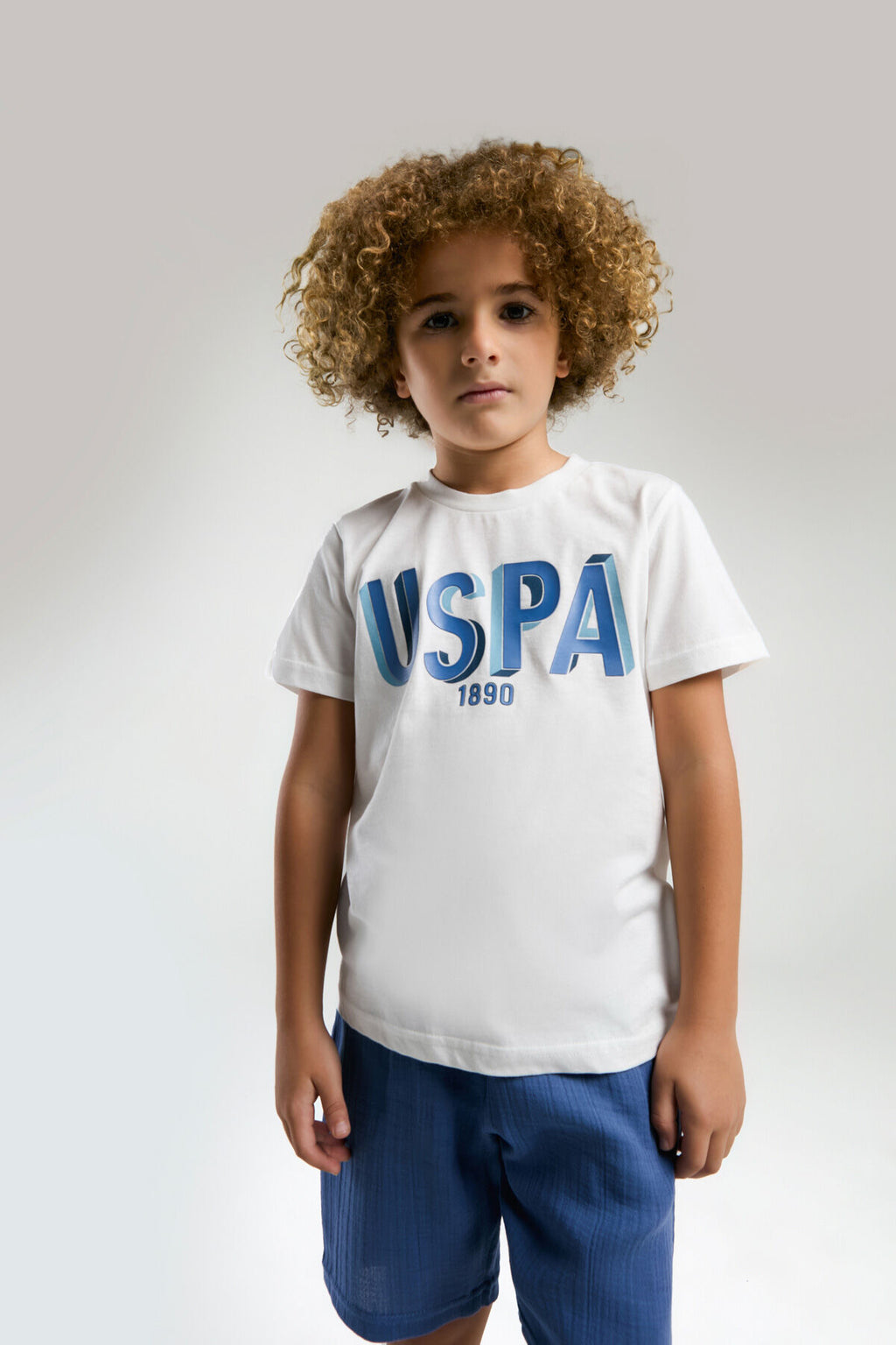 U.S. Polo Assn. Erkek Çocuk Bisiklet Yaka Pigment Baskılı Yazlık Regular Fit Beyaz Bermuda Takım US2039-C-V1