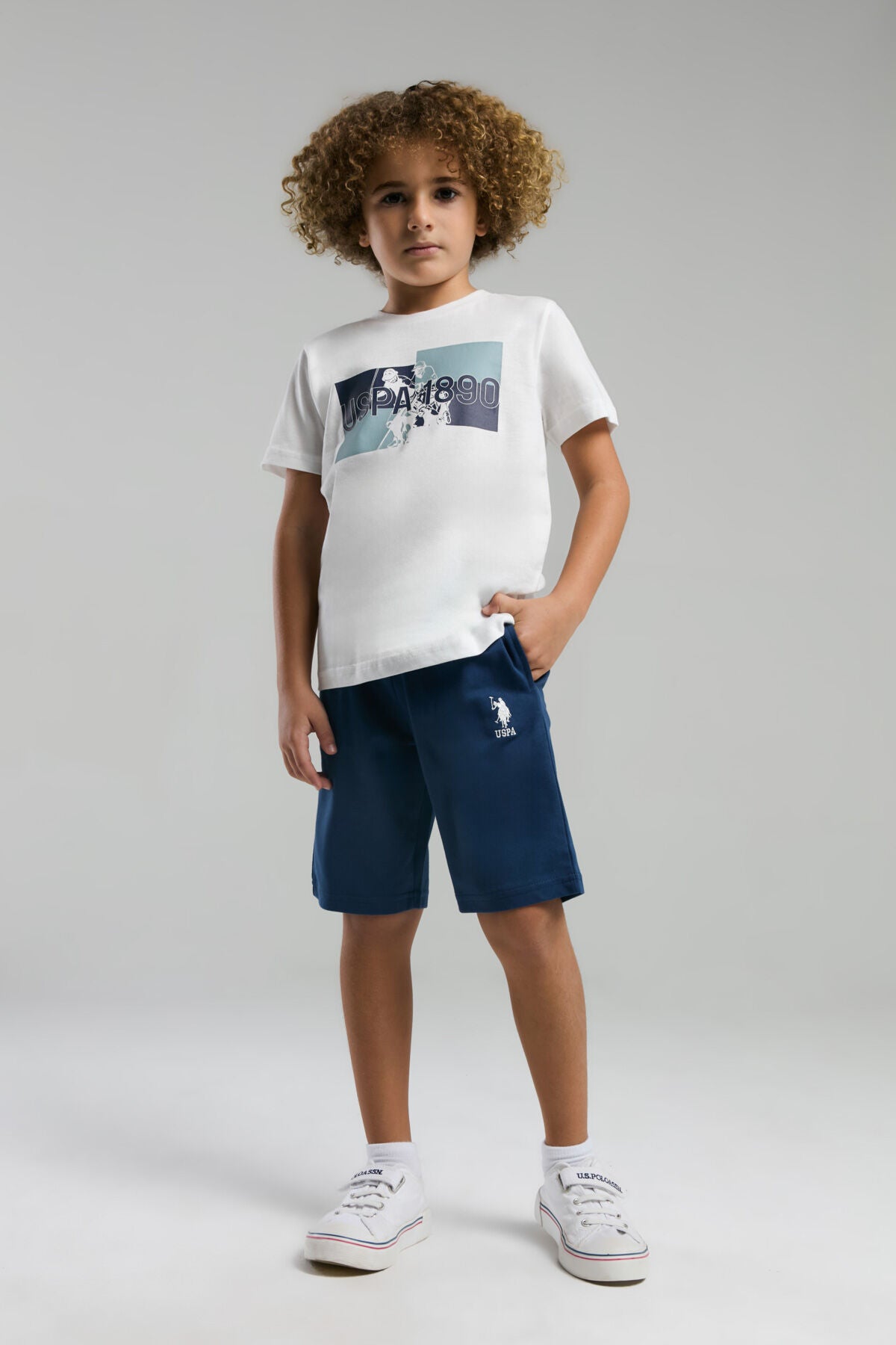 U.S. Polo Assn. Erkek Çocuk Bisiklet Yaka Pigment Baskılı Yazlık Regular Fit Beyaz Bermuda Takım US2012-C-V2 Ürün ana görseli