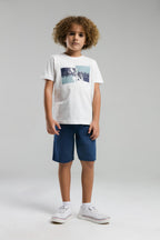 U.S. Polo Assn. Erkek Çocuk Bisiklet Yaka Pigment Baskılı Yazlık Regular Fit Beyaz Bermuda Takım US2012-C-V2