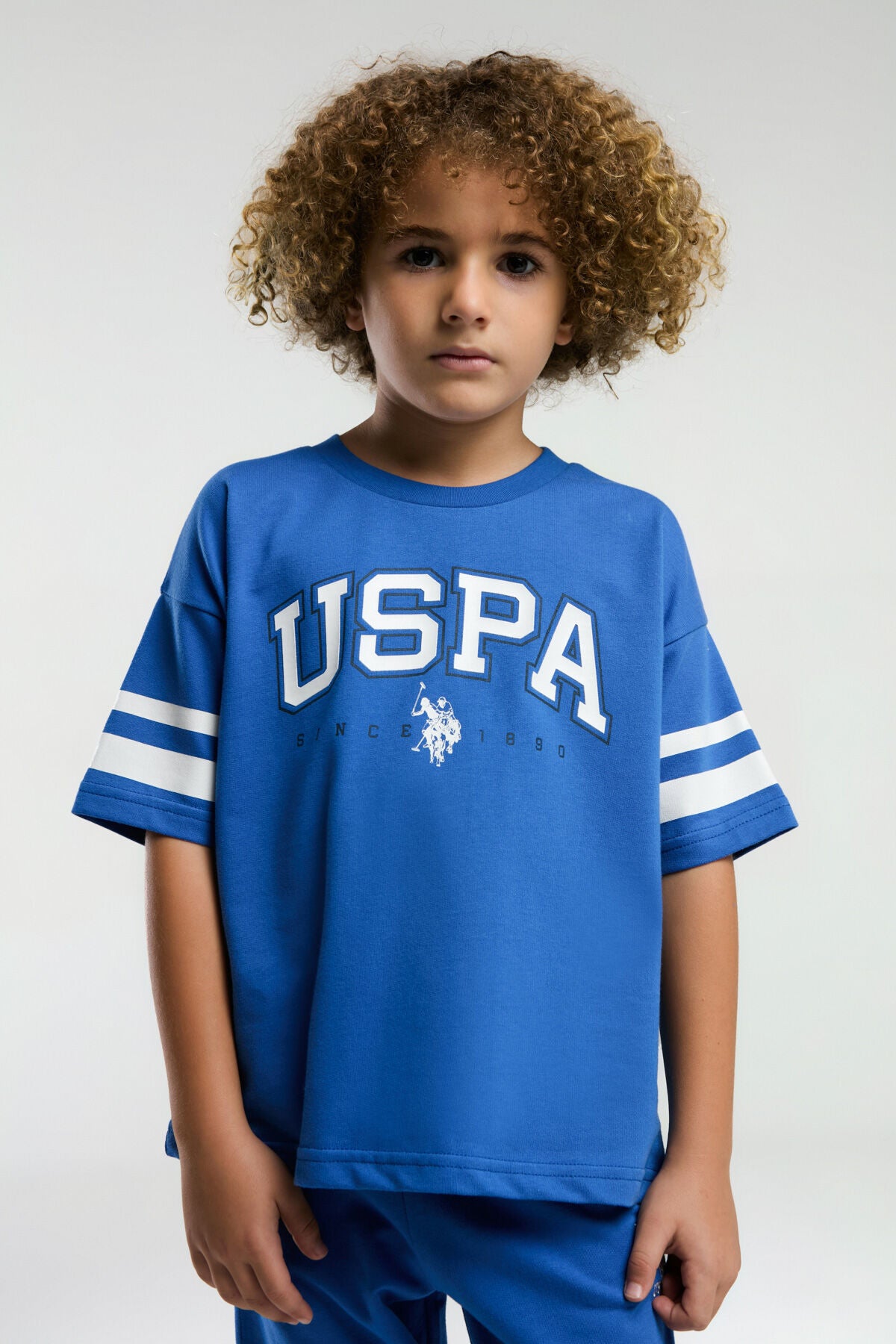 U.S. Polo Assn. Erkek Çocuk Bisiklet Yaka Pigment Baskılı Yazlık Regular Fit Mavi Bermuda Takım US2022-C-V4