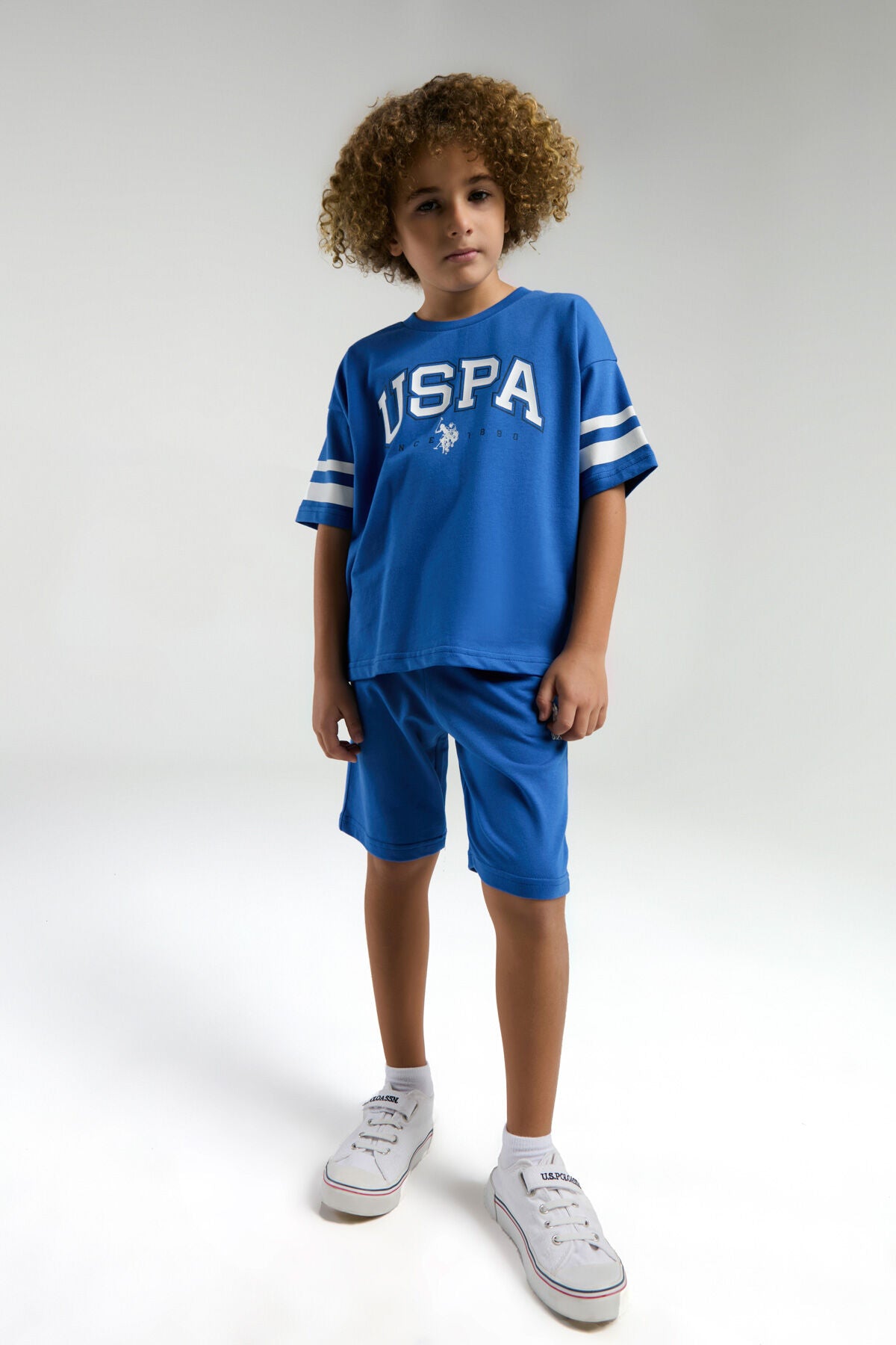 U.S. Polo Assn. Erkek Çocuk Bisiklet Yaka Pigment Baskılı Yazlık Regular Fit Mavi Bermuda Takım US2022-C-V4