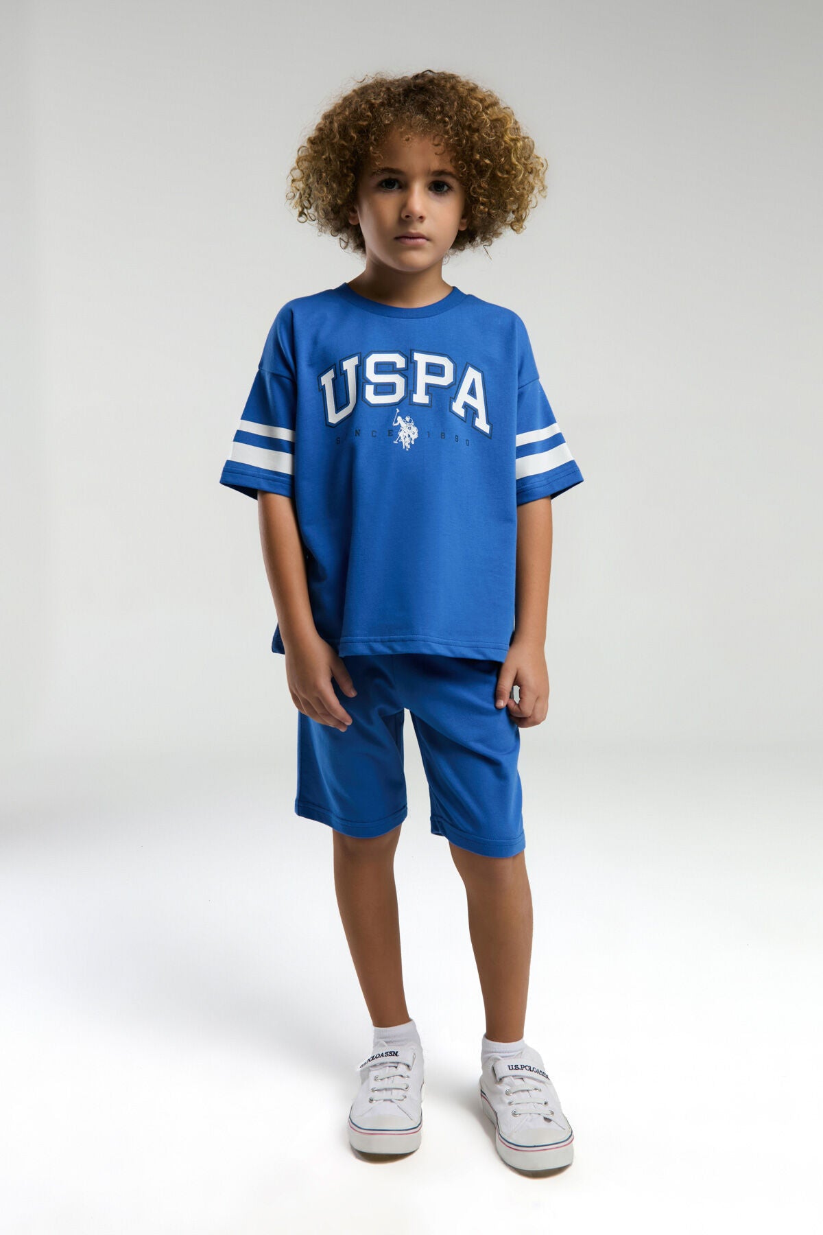 U.S. Polo Assn. Erkek Çocuk Bisiklet Yaka Pigment Baskılı Yazlık Regular Fit Mavi Bermuda Takım US2022-C-V4
