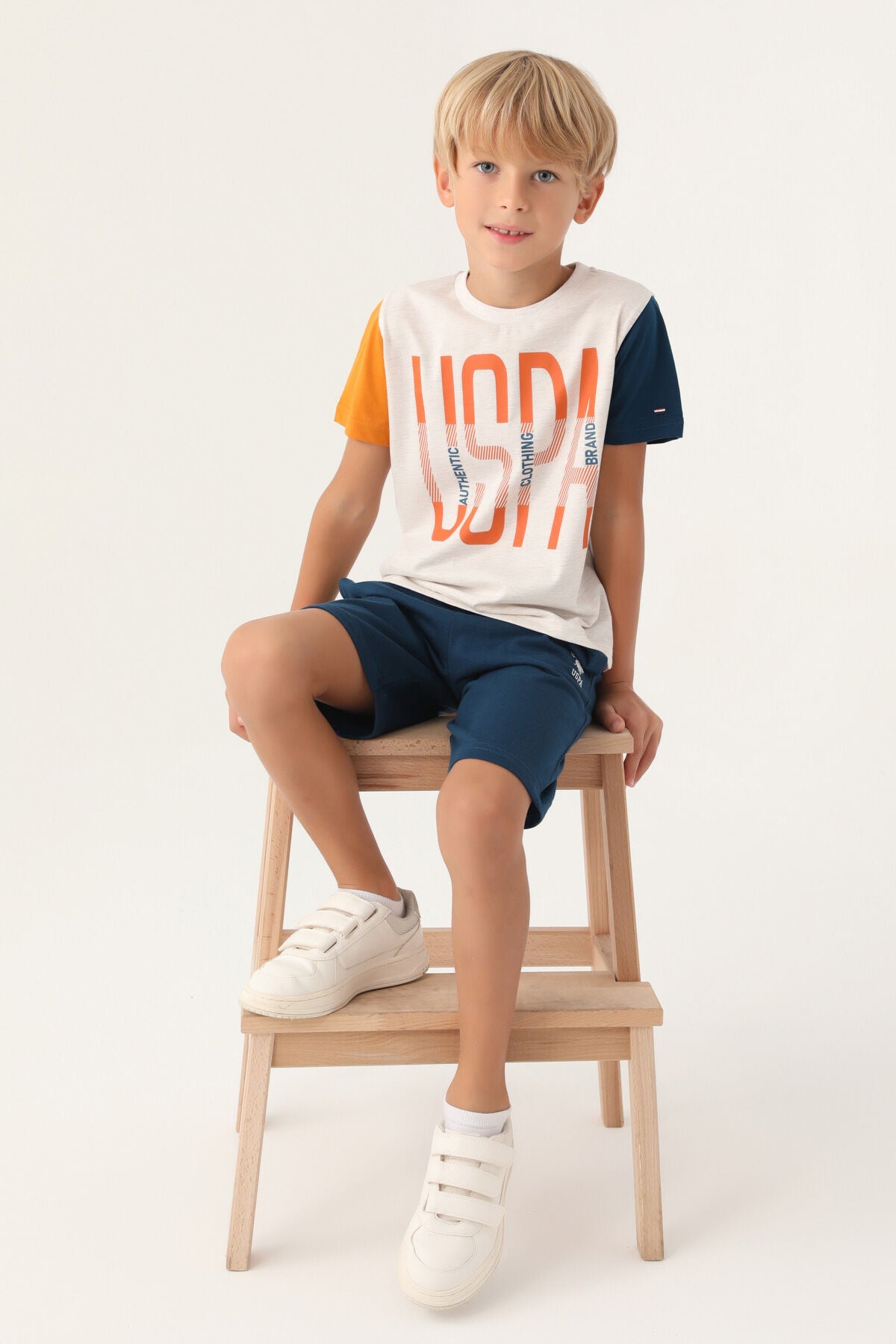 U.S. Polo Assn. Erkek Çocuk Bisiklet Yaka Pigment Baskılı Yazlık Regular Fit Krem Bermuda Takım US1715-C-V2