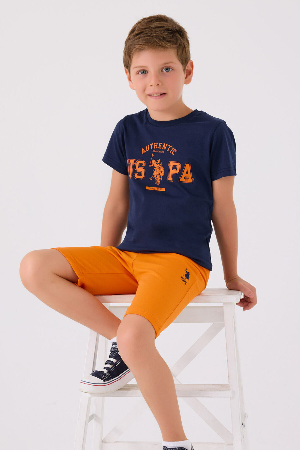 U.S. Polo Assn. Erkek Çocuk Bisiklet Yaka Pigment Baskılı Yazlık Regular Fit Lacivert Bermuda Takım US1390-C-V4