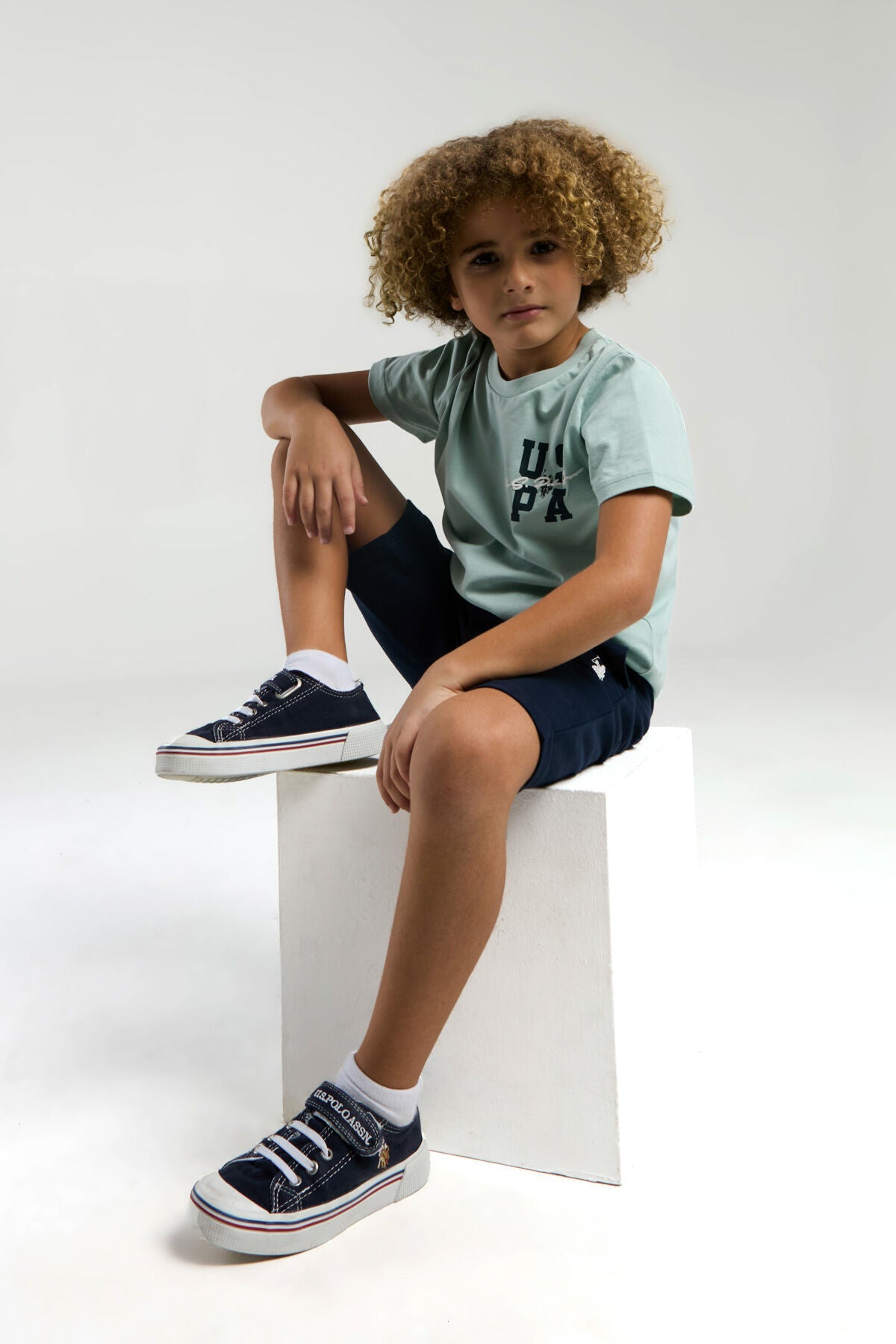 U.S. Polo Assn. Erkek Çocuk Bisiklet Yaka Pigment Baskılı Yazlık Regular Fit Mavi Bermuda Takım US2048-C-V1 Ürün ana görseli
