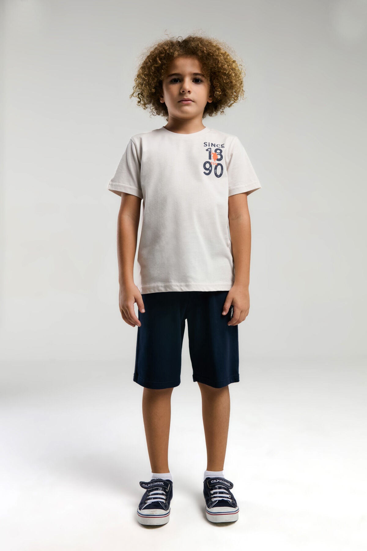 U.S. Polo Assn. Erkek Çocuk Bisiklet Yaka Pigment Baskılı Yazlık Regular Fit Krem Bermuda Takım US2054-C-V2 Ürün ana görseli
