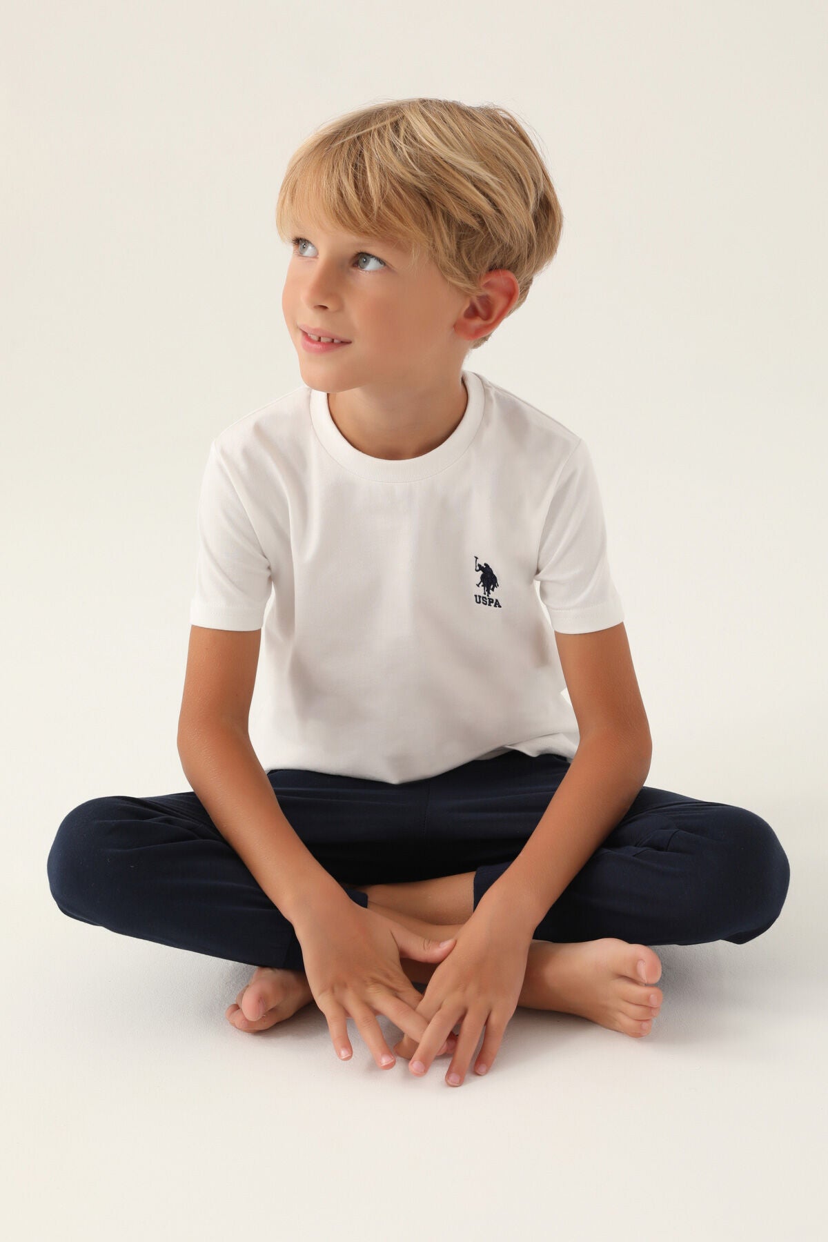 U.S. Polo Assn. Erkek Çocuk Bisiklet Yaka Pigment Baskılı Yazlık Regular Fit Krem Pijama Takımı US1742-C-V1 Ürün ana görseli