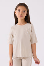 U.S. Polo Assn. Kız Çocuk Bisiklet Yaka Sargı Nakışlı Yazlık Regular Fit Krem Bermuda Takım US1848-C-V19