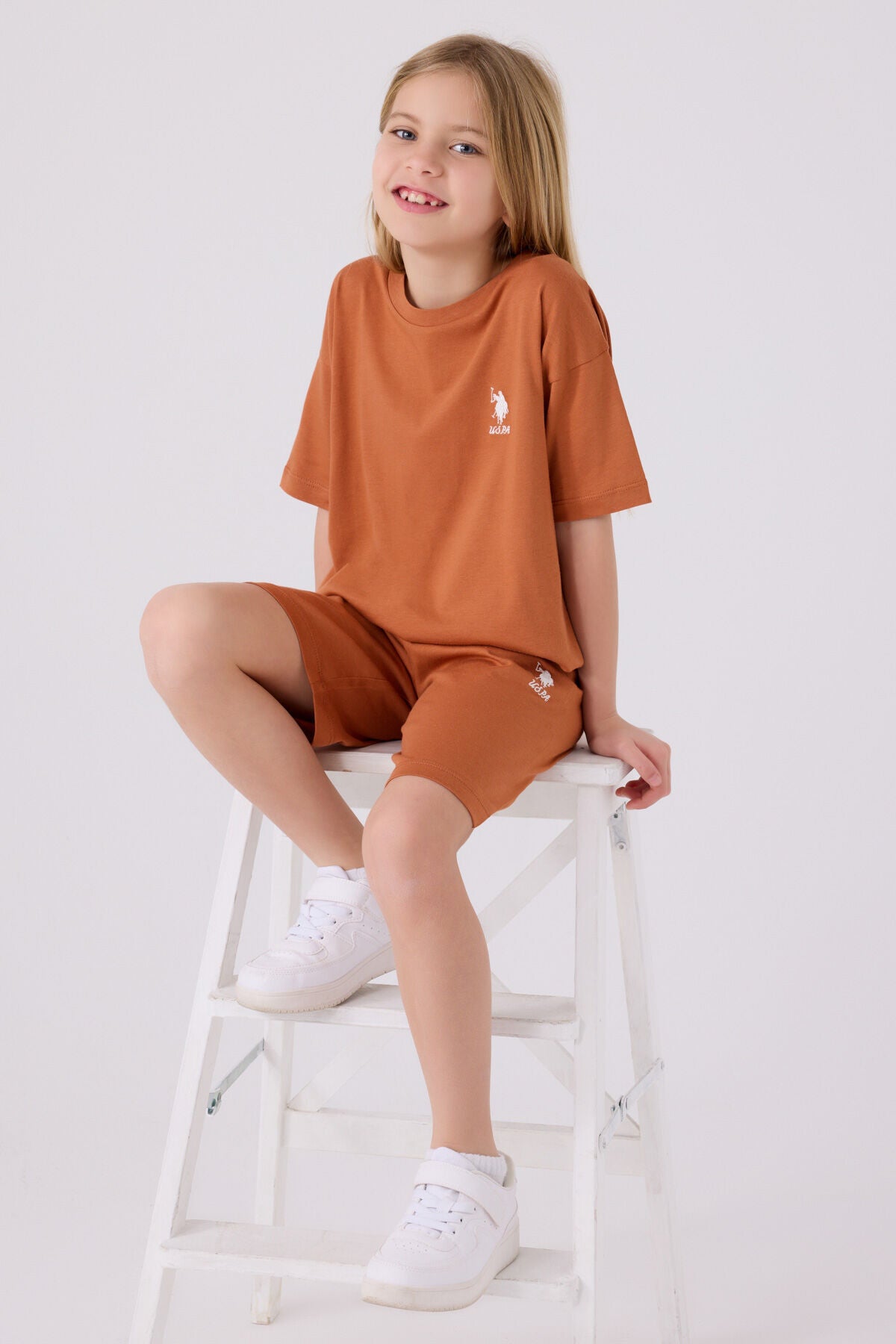 U.S. Polo Assn. Kız Çocuk Bisiklet Yaka Sargı Nakışlı Yazlık Regular Fit Kahverengi Bermuda Takım US1848-C-V30 Ürün ana görseli