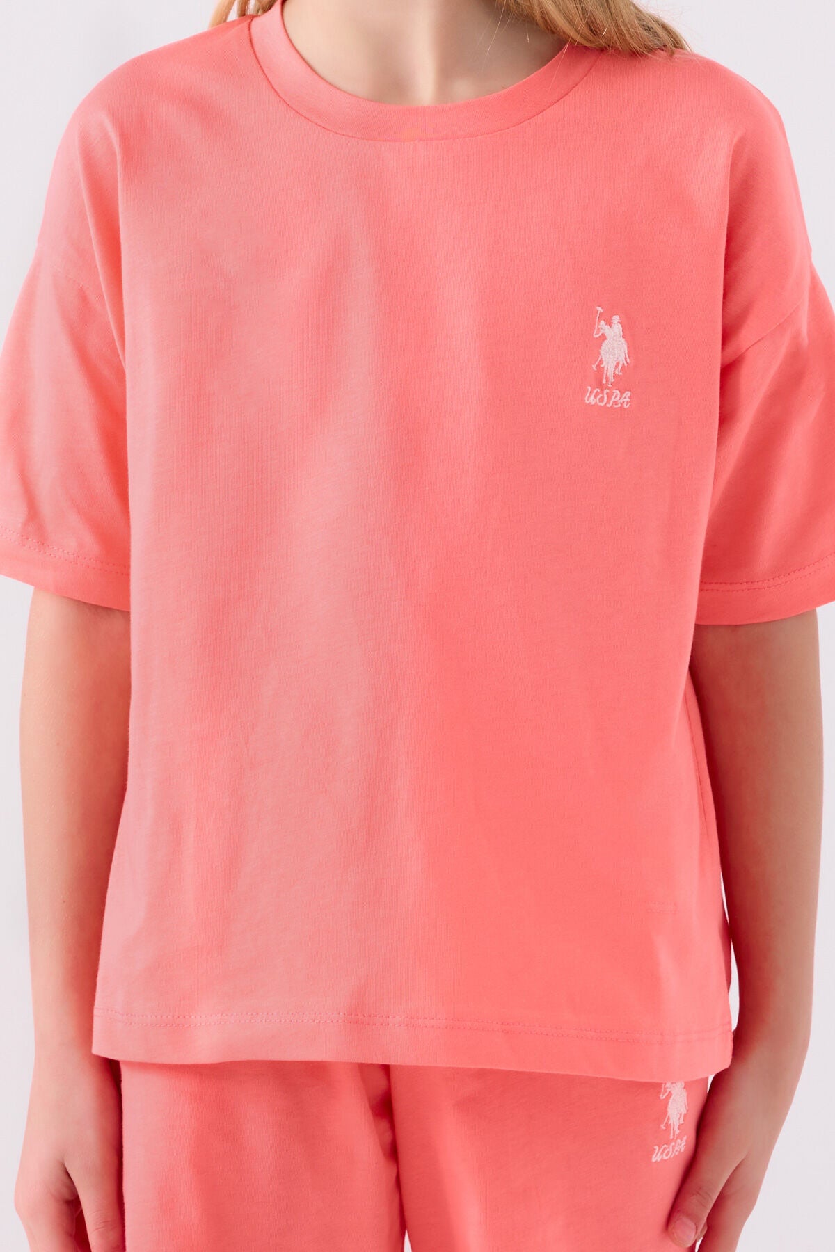 U.S. Polo Assn. Kız Çocuk Bisiklet Yaka Sargı Nakışlı Yazlık Regular Fit Pembe Bermuda Takım US1848-C-V52