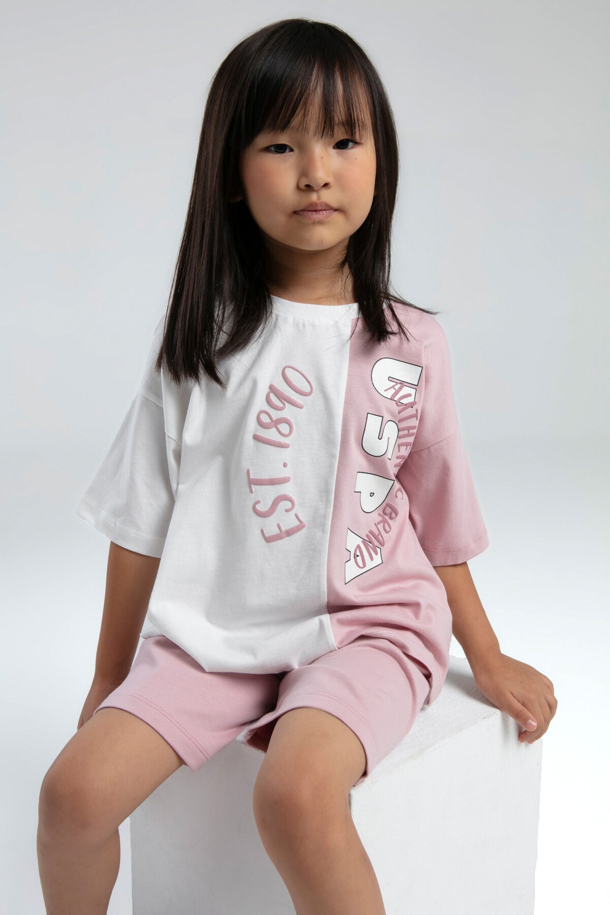 U.S. Polo Assn. Kız Çocuk Bisiklet Yaka Pigment Baskılı Yazlık Regular Fit Pembe Bermuda Takım US2067-C-V1 Ürün ana görseli