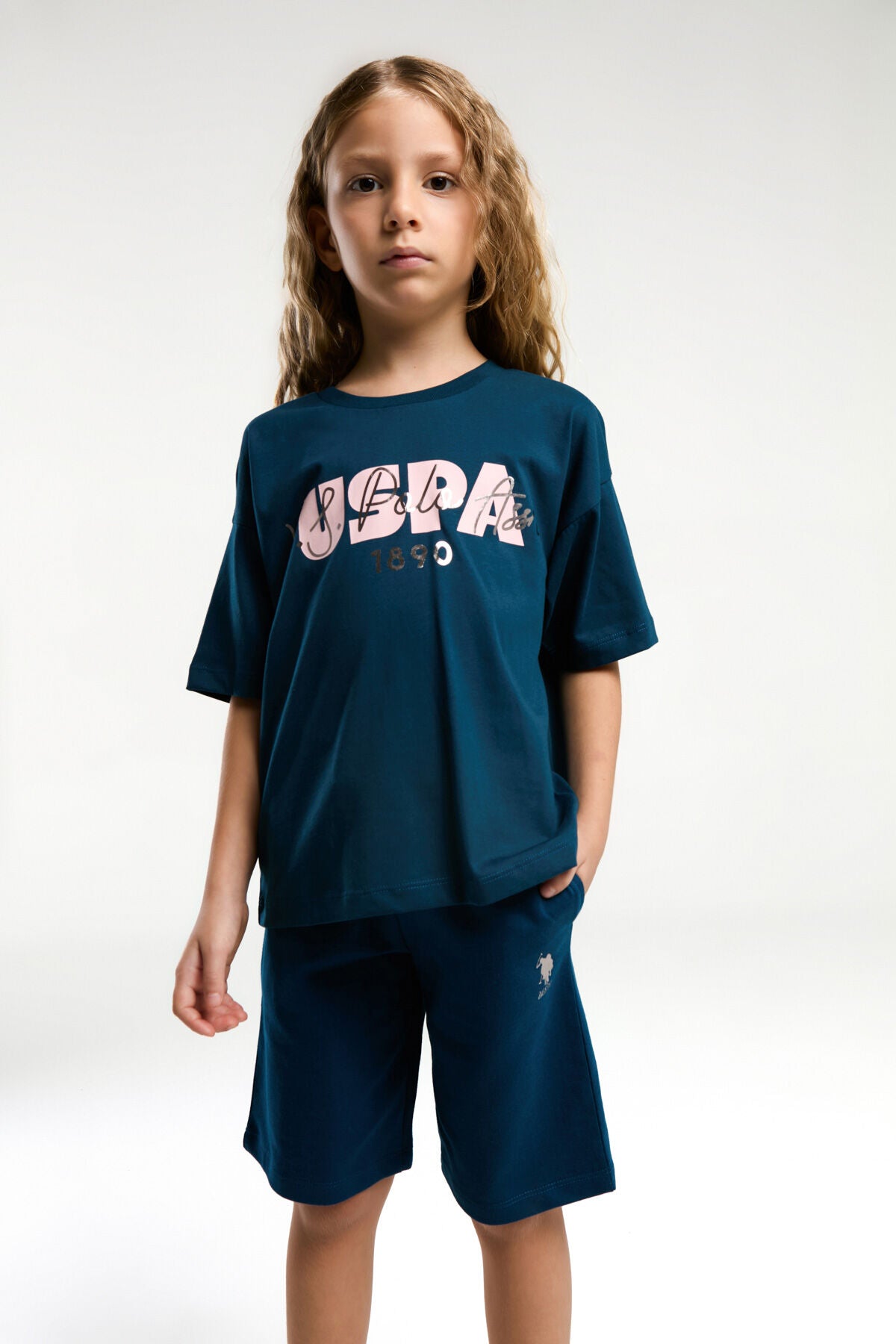U.S. Polo Assn. Kız Çocuk Bisiklet Yaka Pigment Baskılı Yazlık Regular Fit Lacivert Bermuda Takım US2080-C-V2 Ürün ana görseli