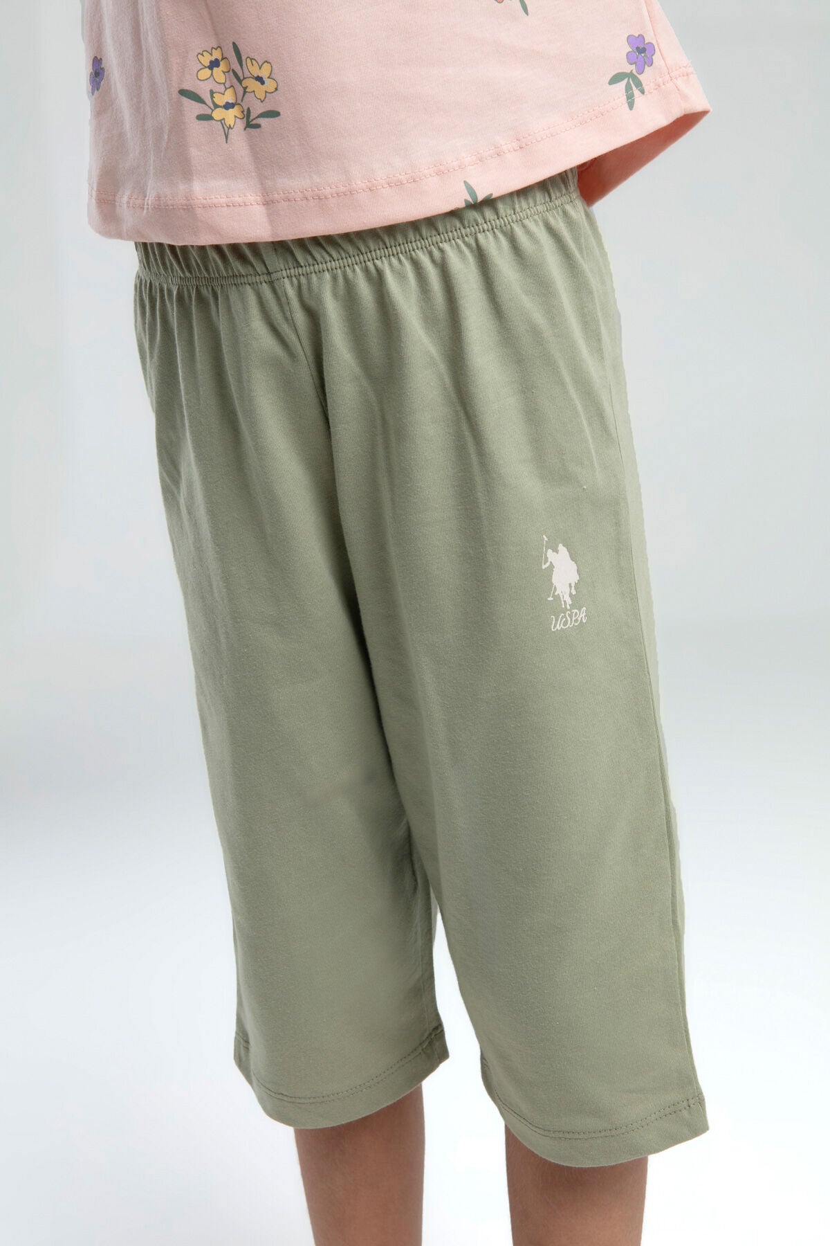 U.S. Polo Assn. Kız Çocuk Bisiklet Yaka Pigment Baskılı Yazlık Regular Fit Pembe Kapri Takım US2069-C-V1