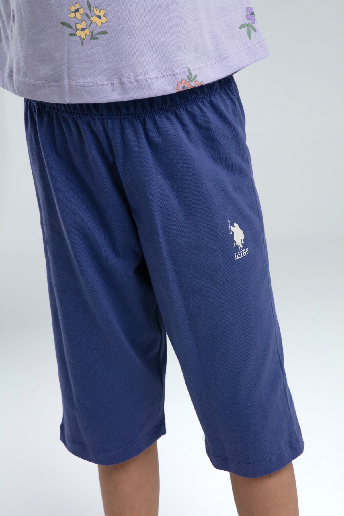U.S. Polo Assn. Kız Çocuk Bisiklet Yaka Pigment Baskılı Yazlık Regular Fit Mor Kapri Takım US2069-C-V2