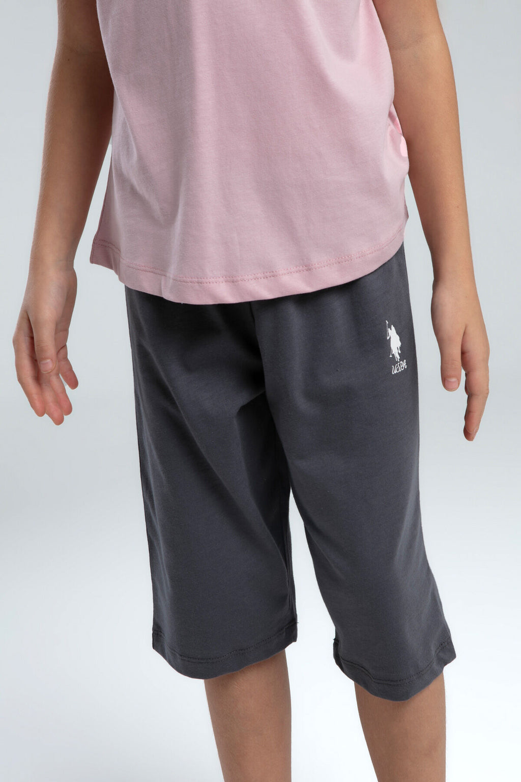 U.S. Polo Assn. Kız Çocuk Bisiklet Yaka Pigment Baskılı Yazlık Regular Fit Pembe Kapri Takım US2068-C-V1