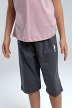 U.S. Polo Assn. Kız Çocuk Bisiklet Yaka Pigment Baskılı Yazlık Regular Fit Pembe Kapri Takım US2068-C-V1