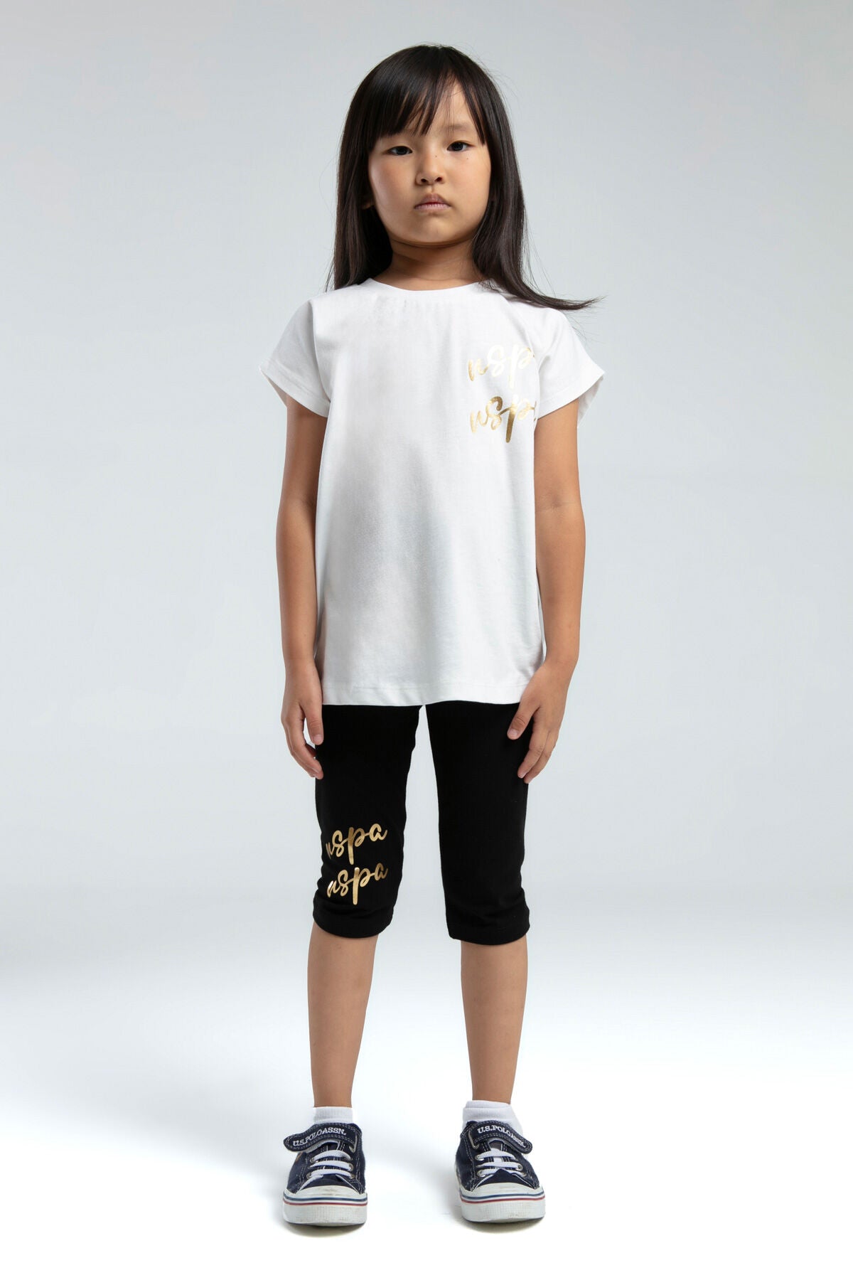 U.S. Polo Assn. Kız Çocuk Bisiklet Yaka Pigment Baskılı Yazlık Regular Fit Beyaz Tayt Takım US2081-C-V1 Ürün ana görseli