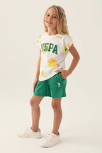 U.S. Polo Assn. Kız Çocuk Bisiklet Yaka Pigment Baskılı Yazlık Regular Fit Krem Şort Takım US1843-C-V2