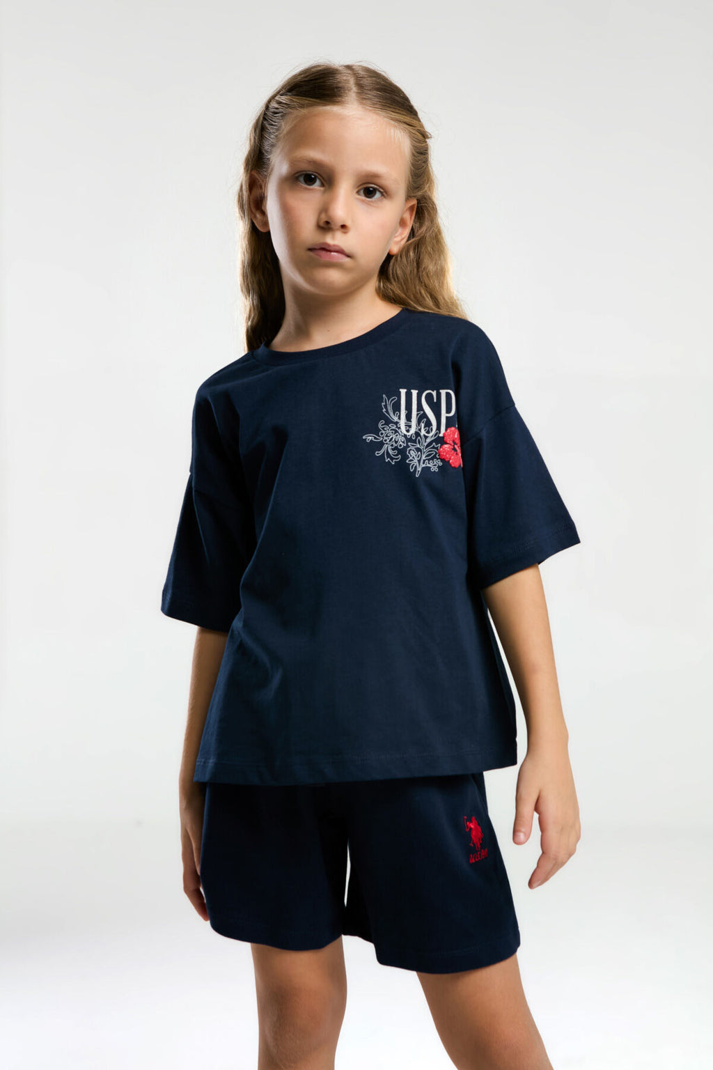 U.S. Polo Assn. Kız Çocuk Bisiklet Yaka Pigment Baskılı Yazlık Regular Fit Lacivert Şort Takım US2072-C-V1