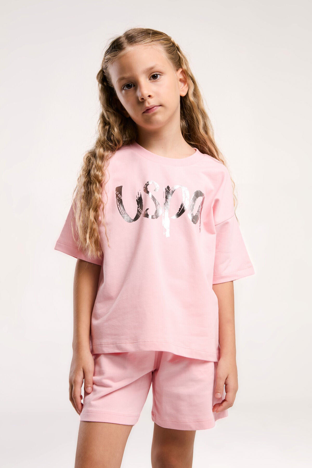 U.S. Polo Assn. Kız Çocuk Bisiklet Yaka Pigment Baskılı Yazlık Regular Fit Pembe Şort Takım US2082-C-V2 Ürün ana görseli