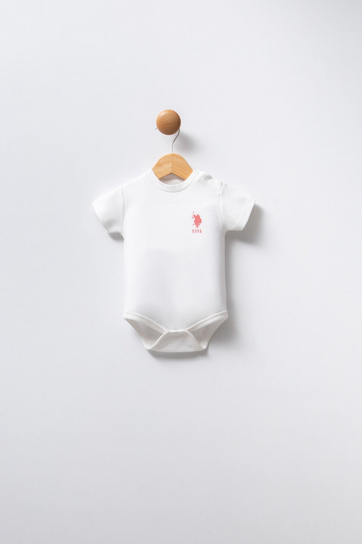 U.S. Polo Assn. Kız Bebek Bisiklet Yaka Pigment Baskılı Yazlık Regular Fit Pembe Badi Zıbın USB2353-C-V1