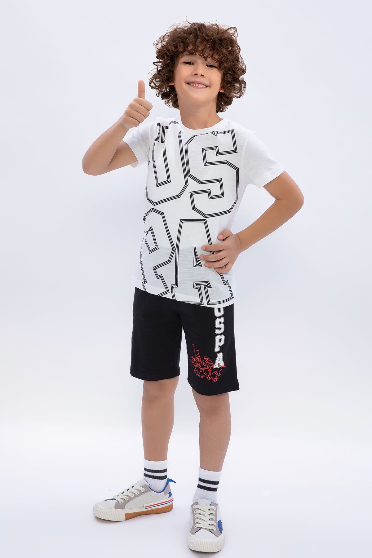 U.S. Polo Assn. Erkek Çocuk Bisiklet Yaka Pigment Baskılı Yazlık Regular Fit Krem Bermuda Takım US1090-C-V-1 Ürün ana görseli
