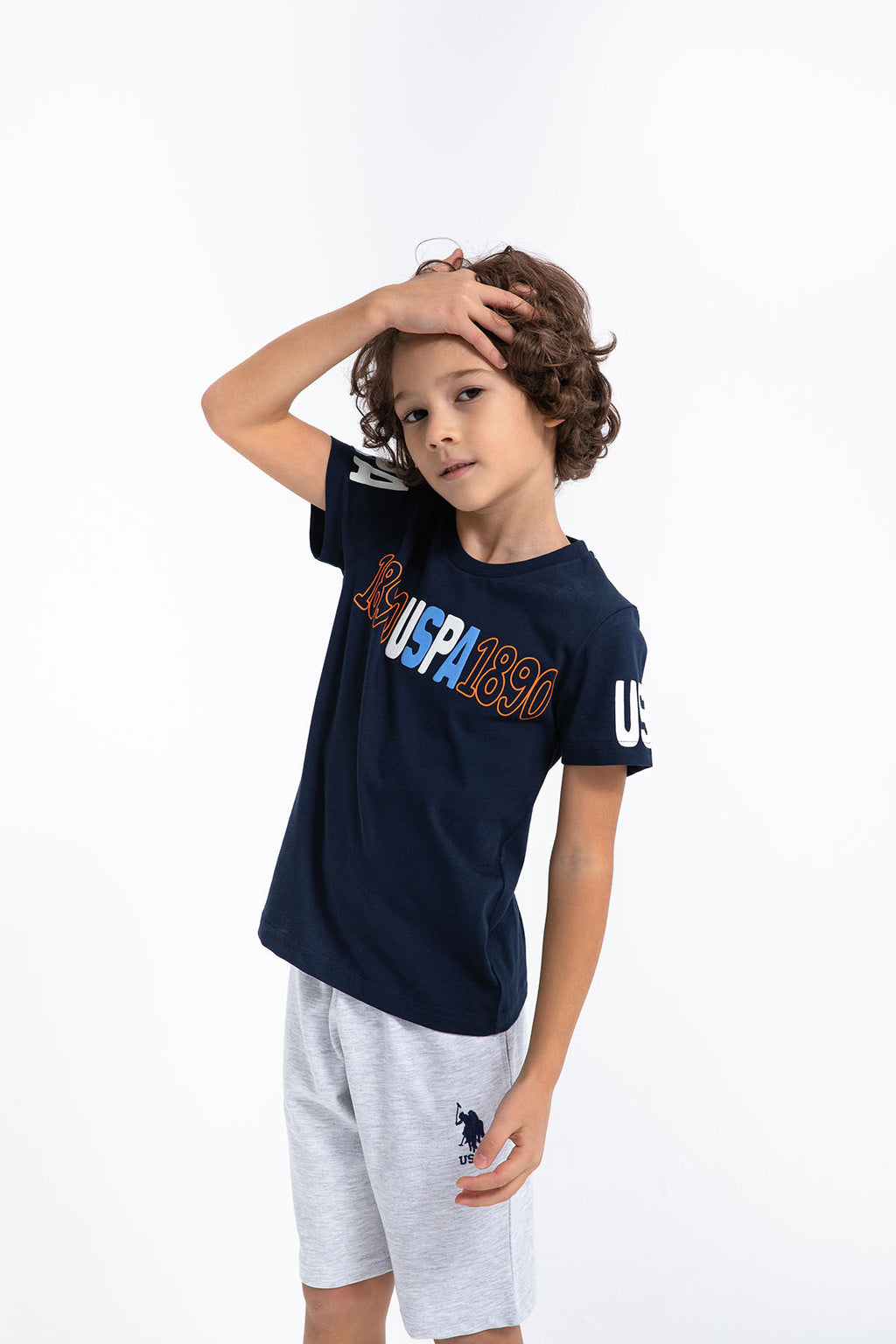 U.S. Polo Assn. Erkek Çocuk Bisiklet Yaka Pigment Baskılı Yazlık Regular Fit Lacivert Bermuda Takım US1018-C-V-1