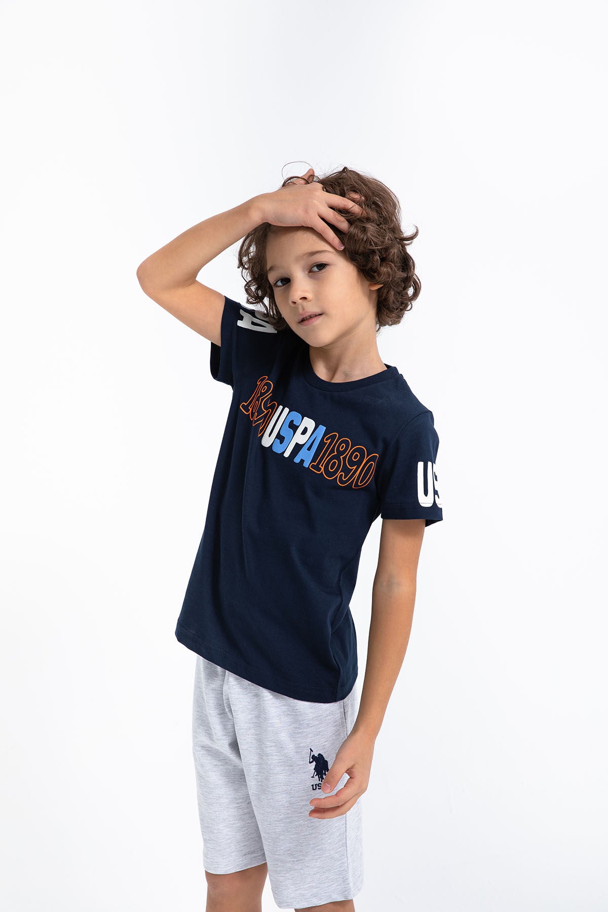 U.S. Polo Assn. Erkek Çocuk Bisiklet Yaka Pigment Baskılı Yazlık Regular Fit Lacivert Bermuda Takım US1018-C-V-1