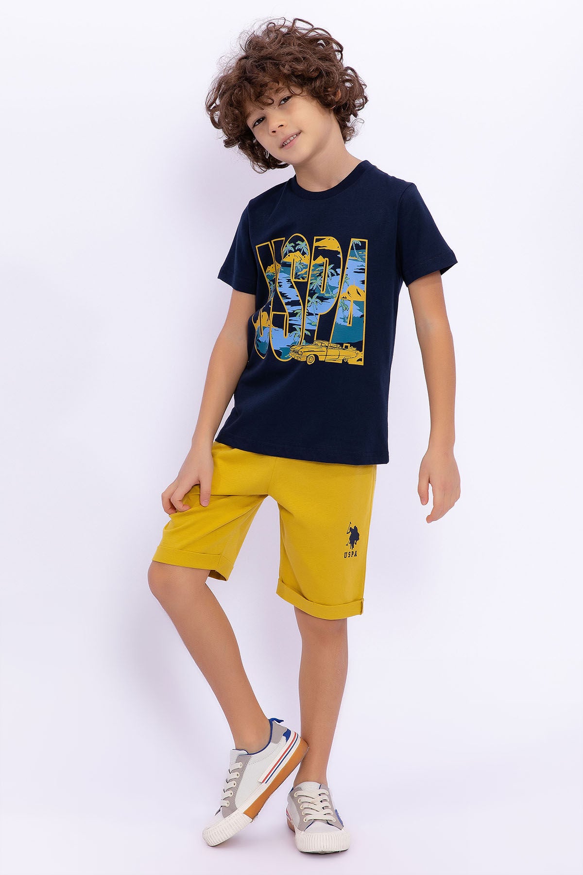 U.S. Polo Assn. Erkek Çocuk Bisiklet Yaka Pigment Baskılı Yazlık Regular Fit Lacivert Bermuda Takım US1015-C-V-2 Ürün ana görseli