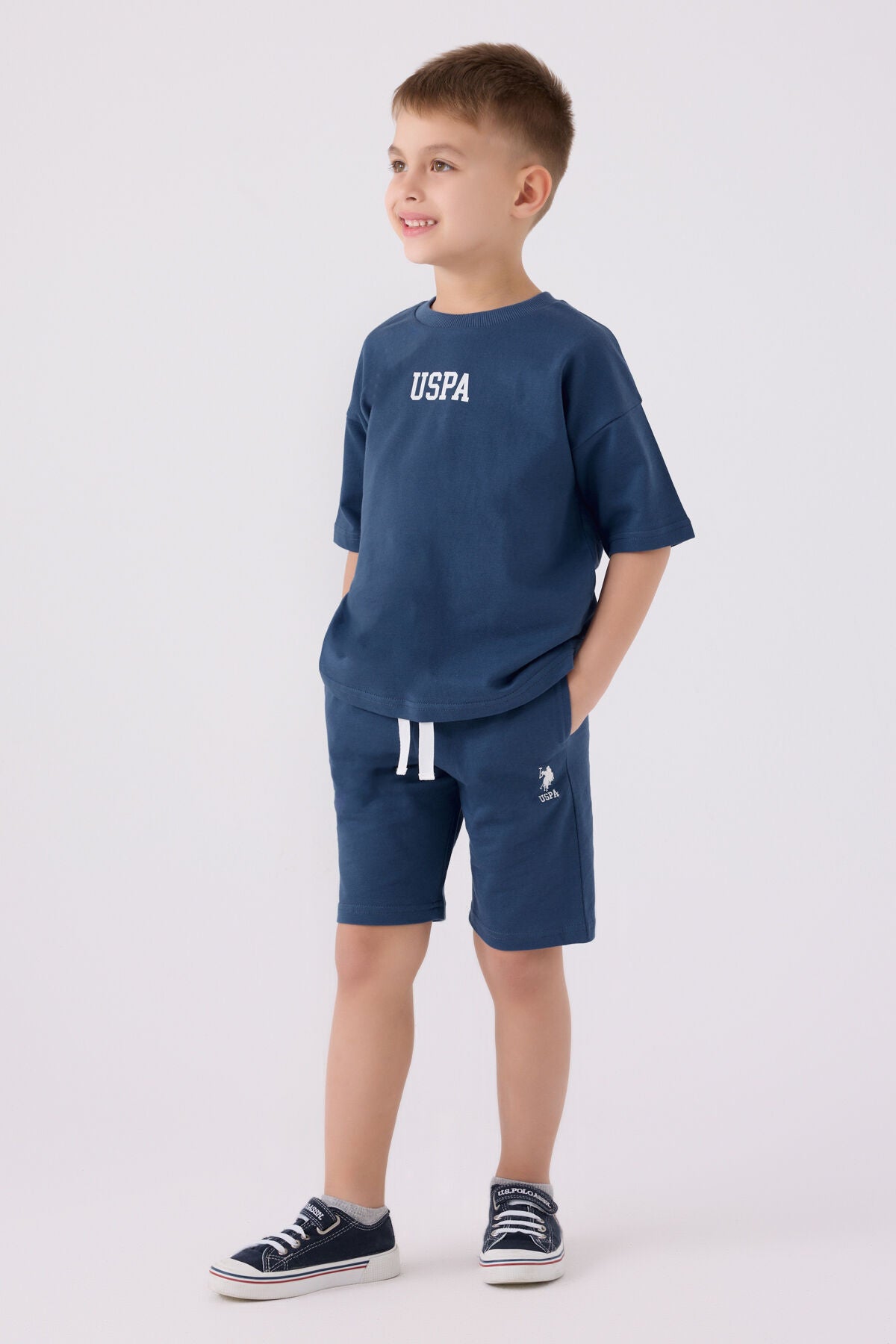 U.S. Polo Assn. Erkek Çocuk Bisiklet Yaka Pigment Baskılı Yazlık Regular Fit Mavi Bermuda Takım US1781-C-V6 Ürün ana görseli