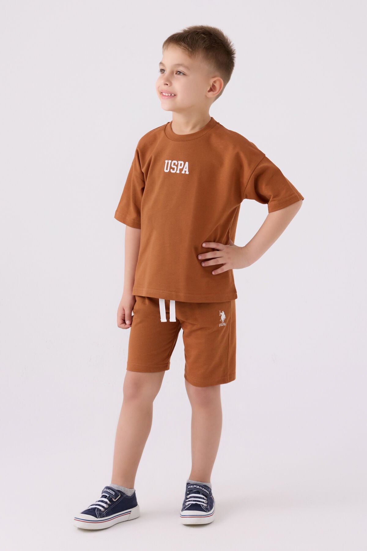 U.S. Polo Assn. Erkek Çocuk Bisiklet Yaka Pigment Baskılı Yazlık Regular Fit Kahve Bermuda Takım US1781-C-V15 Ürün ana görseli