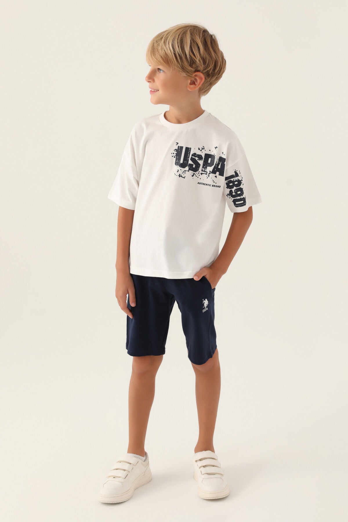 U.S. Polo Assn. Erkek Çocuk Bisiklet Yaka Pigment Baskılı Yazlık Regular Fit Krem Bermuda Takım US1735-C-V1