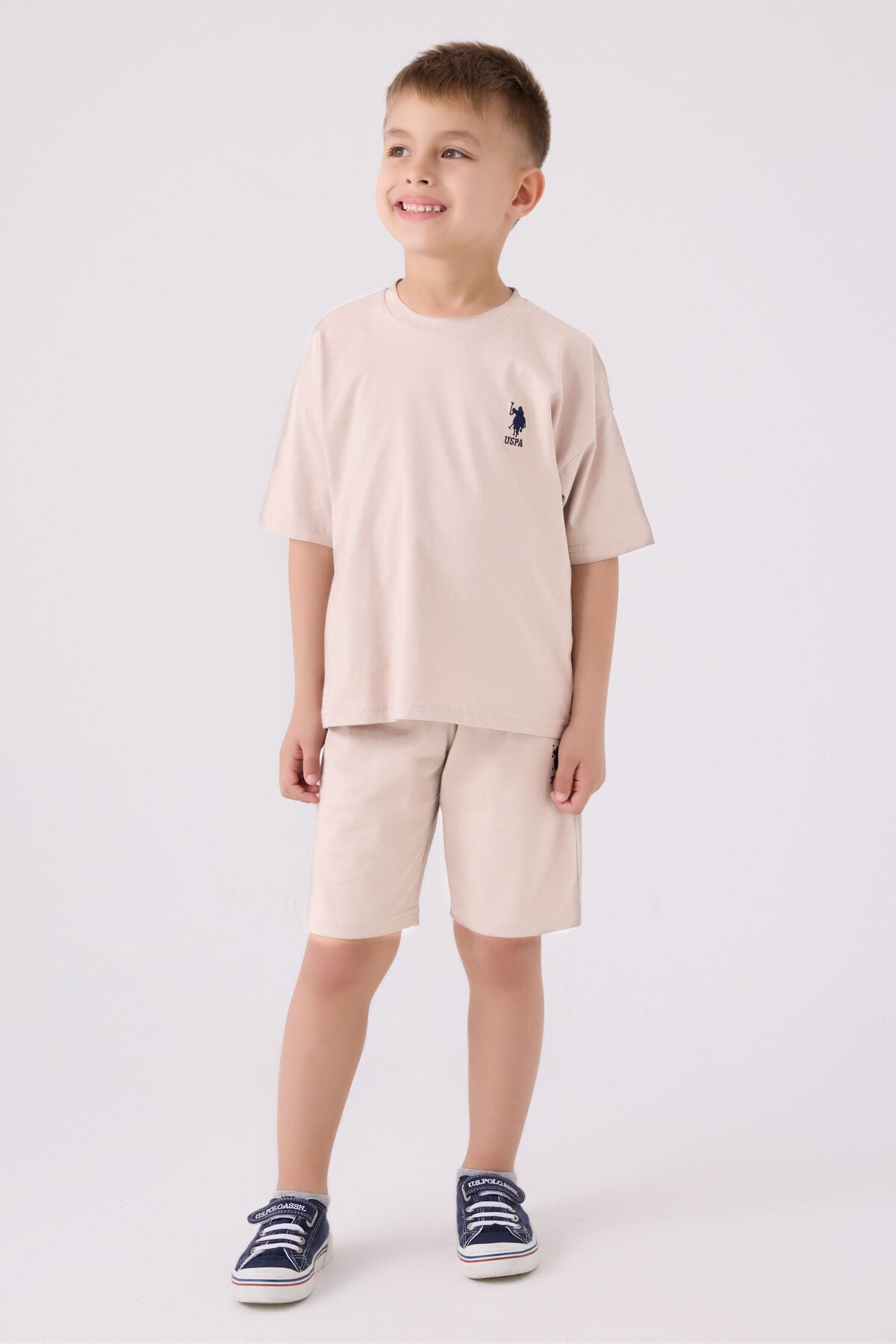 U.S. Polo Assn. Erkek Çocuk Bisiklet Yaka Sargı Nakışlı Yazlık Regular Fit Krem Bermuda Takım US1779-C-V39 Ürün ana görseli