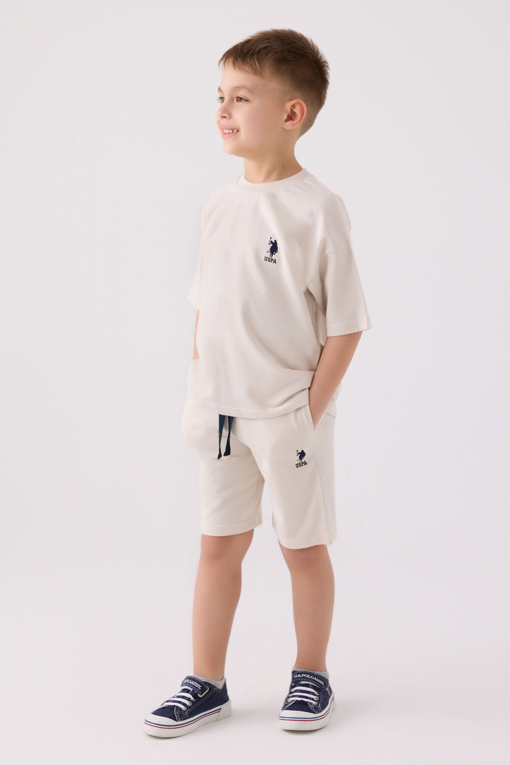 U.S. Polo Assn. Erkek Çocuk Bisiklet Yaka Pigment Baskılı Yazlık Regular Fit Krem Bermuda Takım US1780-C-V2