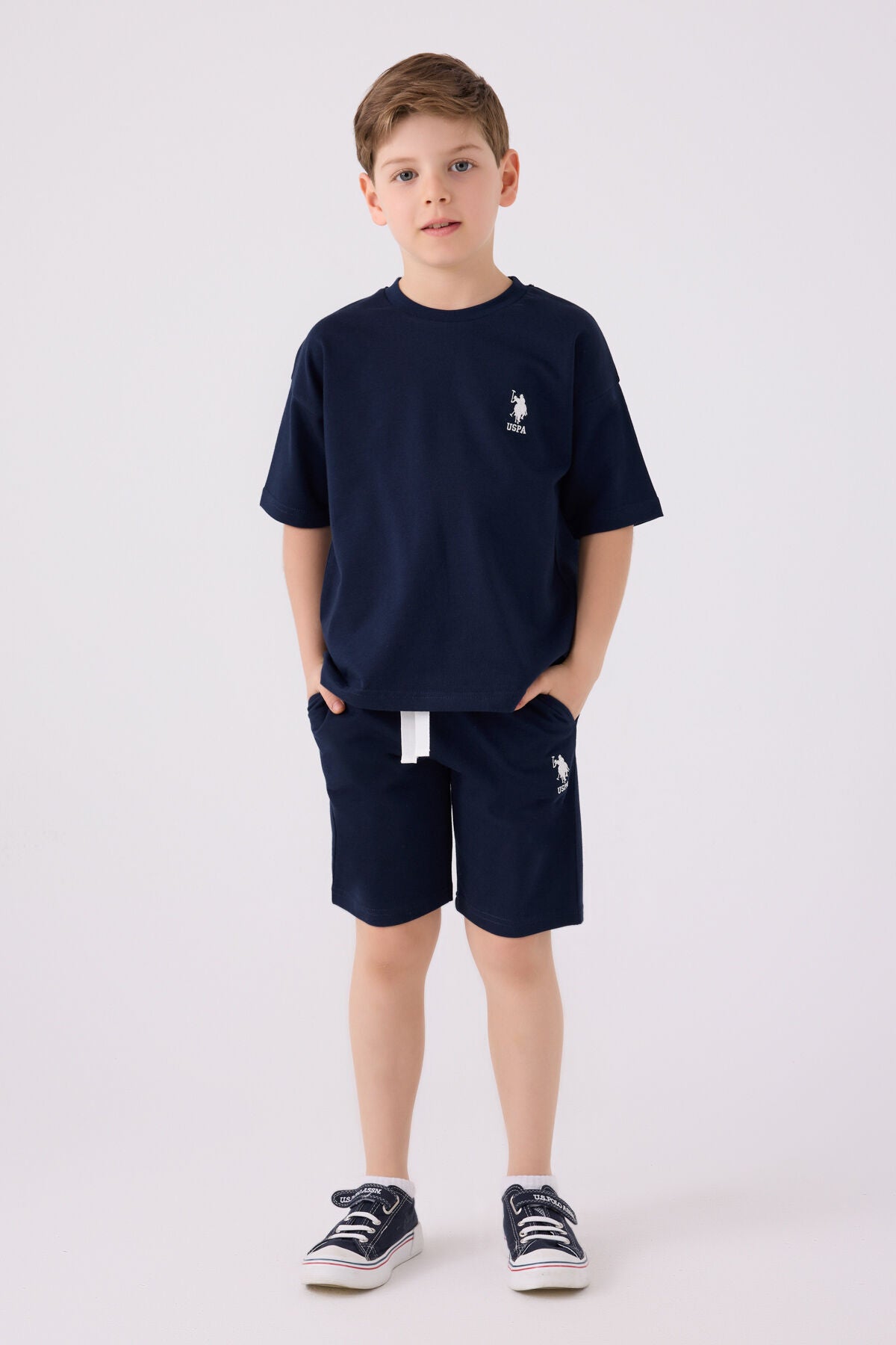 U.S. Polo Assn. Erkek Çocuk Bisiklet Yaka Sargı Nakışlı Yazlık Regular Fit Lacivert Bermuda Takım US1780-C-V1 Ürün ana görseli
