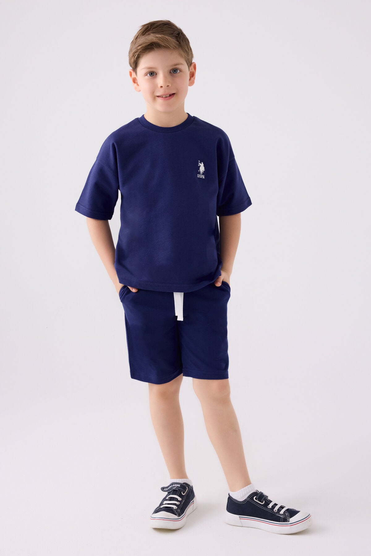 U.S. Polo Assn. Erkek Çocuk Bisiklet Yaka Sargı Nakışlı Yazlık Regular Fit Lacivert Bermuda Takım US1780-C-V10 Ürün ana görseli