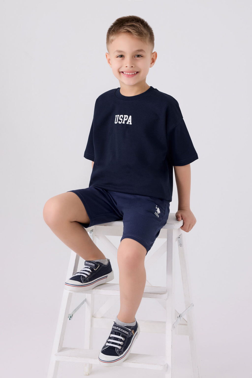 U.S. Polo Assn. Erkek Çocuk Bisiklet Yaka Pigment Baskılı Yazlık Regular Fit Lacivert Bermuda Takım US1781-C-V2