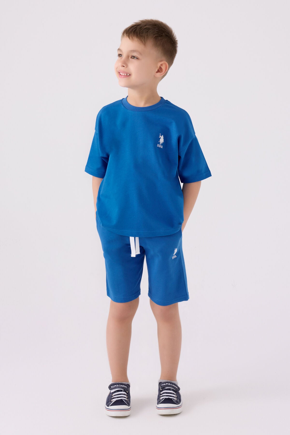 U.S. Polo Assn. Erkek Çocuk Bisiklet Yaka Pigment Baskılı Yazlık Regular Fit Mavi Bermuda Takım US1780-C-V6 Ürün ana görseli