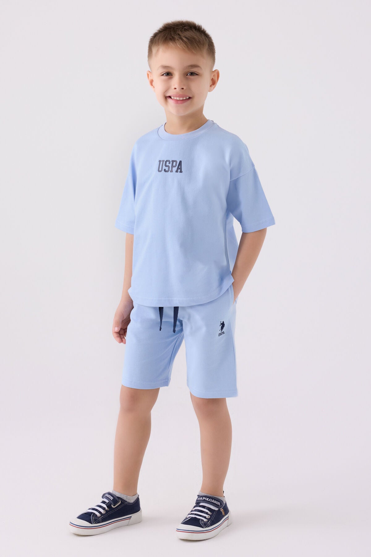 U.S. Polo Assn. Erkek Çocuk Bisiklet Yaka Pigment Baskılı Yazlık Regular Fit Mavi Bermuda Takım US1781-C-V10 Ürün ana görseli