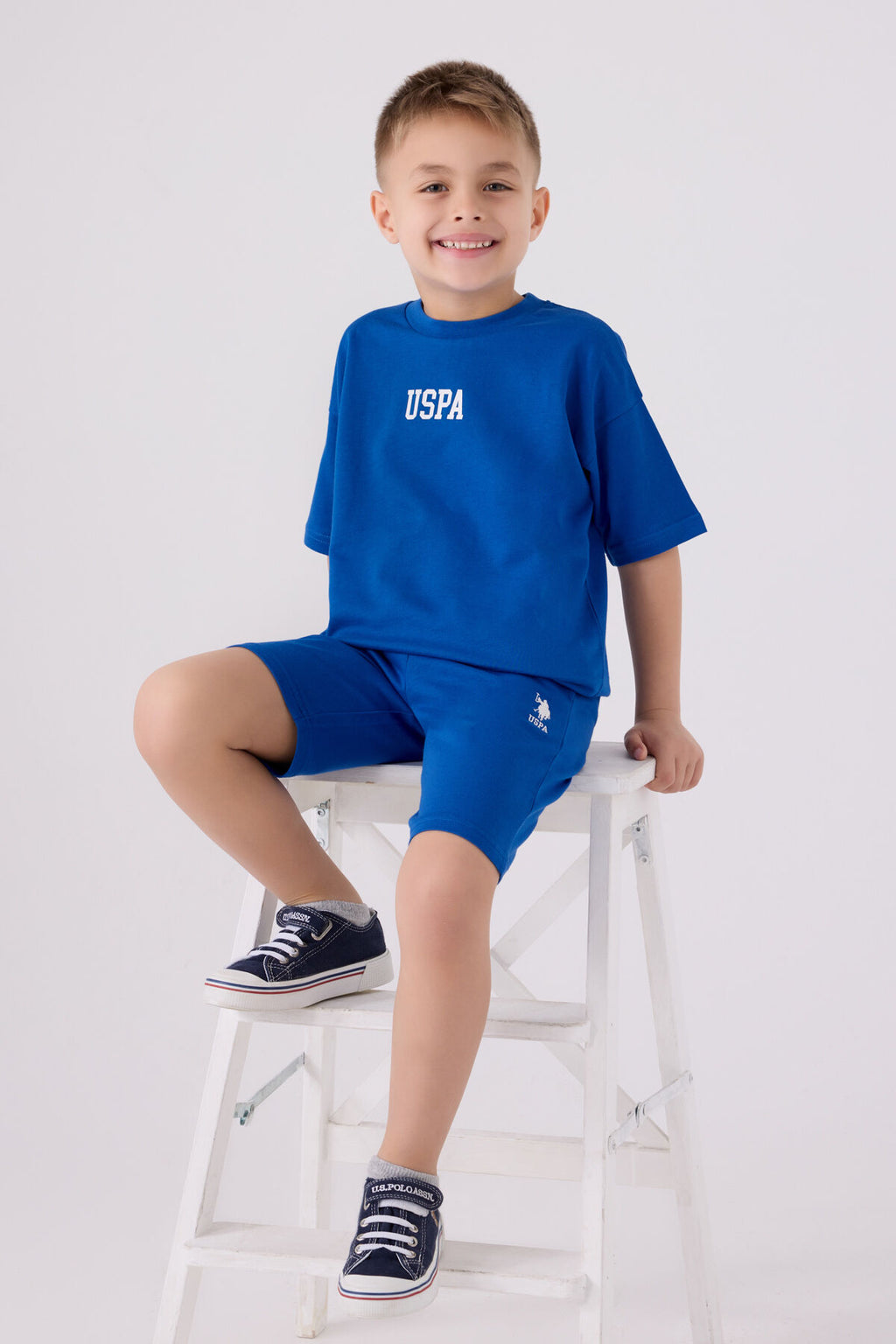 U.S. Polo Assn. Erkek Çocuk Bisiklet Yaka Pigment Baskılı Yazlık Regular Fit Mavi Bermuda Takım US1781-C-V7