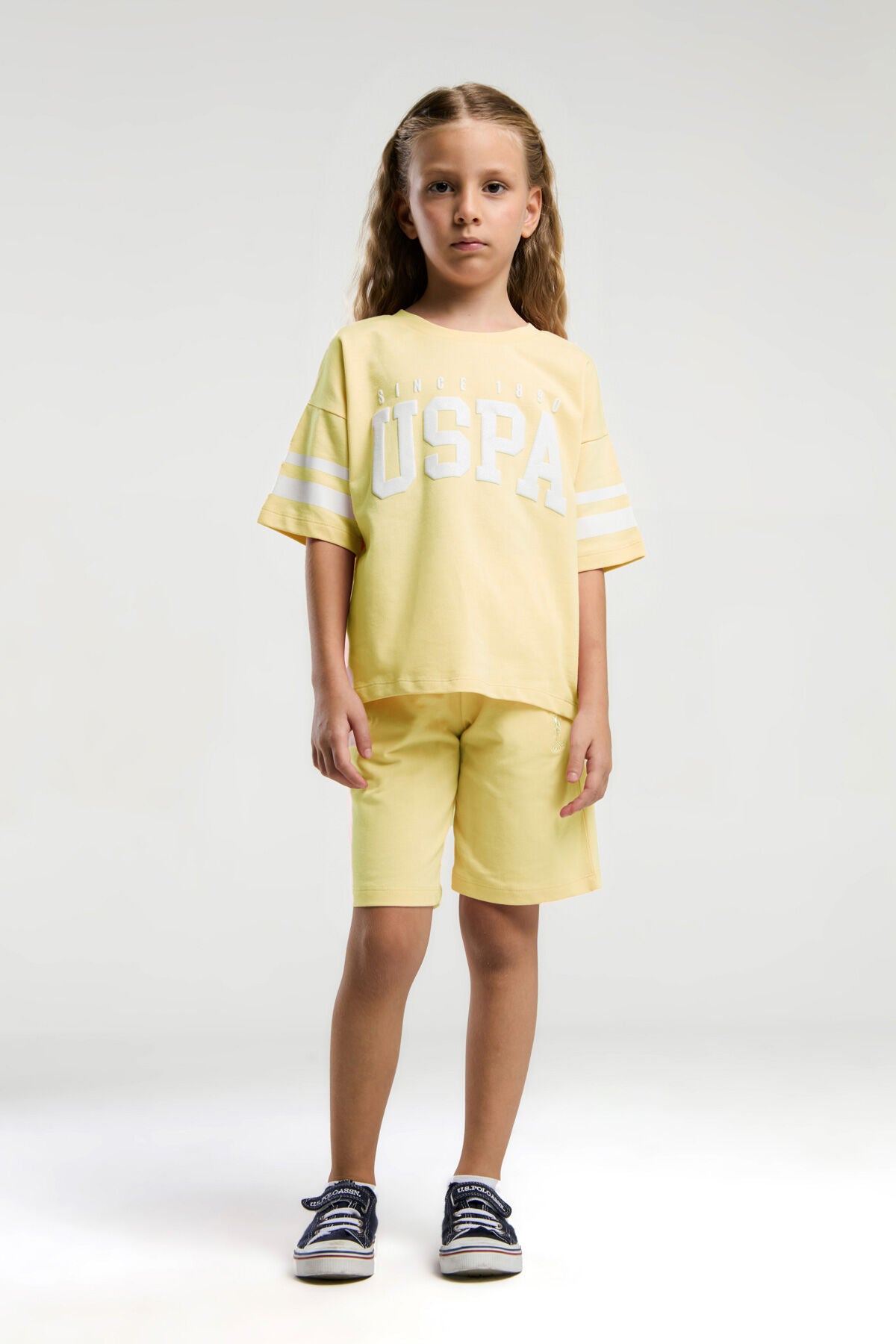 U.S. Polo Assn. Kız Çocuk Bisiklet Yaka Pigment Baskılı Yazlık Regular Fit Sarı Bermuda Takım US2116-C-V2 Ürün ana görseli
