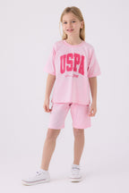 U.S. Polo Assn. Kız Çocuk Bisiklet Yaka Pigment Baskılı Yazlık Regular Fit Pembe Bermuda Takım US1849-C-V6