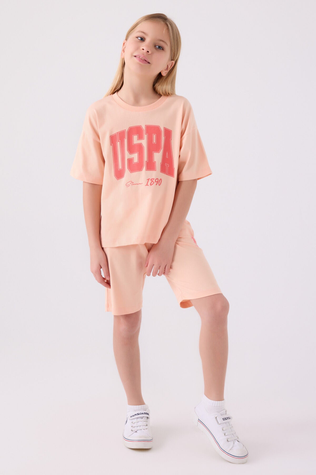 U.S. Polo Assn. Kız Çocuk Bisiklet Yaka Pigment Baskılı Yazlık Regular Fit Pembe Bermuda Takım US1849-C-V1 Ürün ana görseli