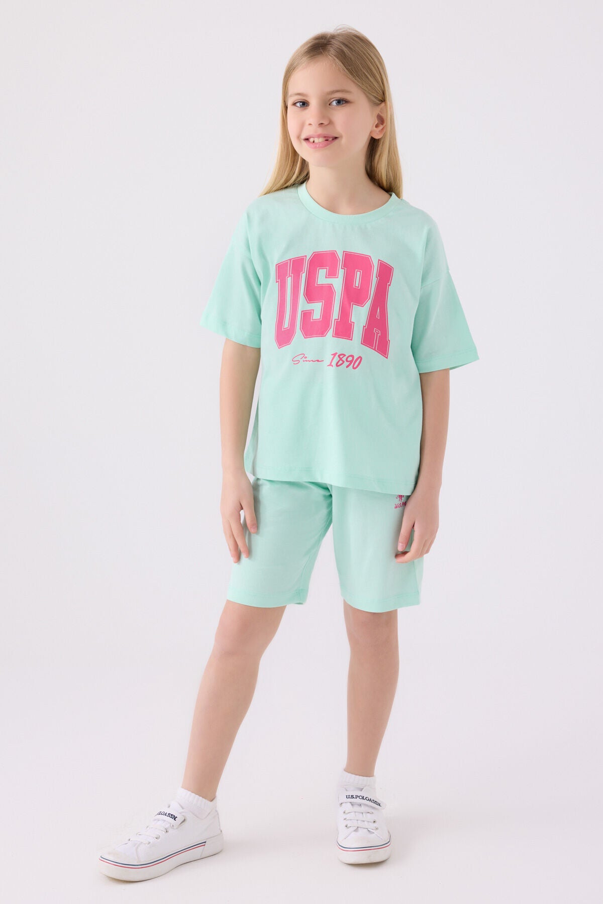 U.S. Polo Assn. Kız Çocuk Bisiklet Yaka Pigment Baskılı Yazlık Regular Fit Mavi Bermuda Takım US1849-C-V2 Ürün ana görseli