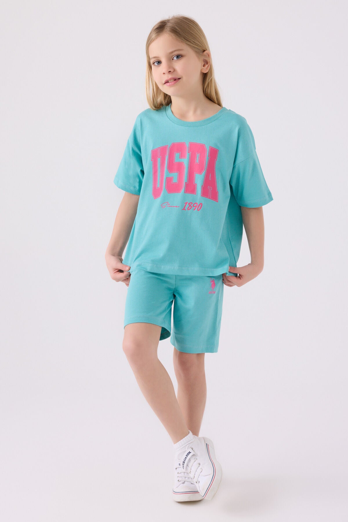 U.S. Polo Assn. Kız Çocuk Bisiklet Yaka Pigment Baskılı Yazlık Regular Fit Mavi Bermuda Takım US1849-C-V4 Ürün ana görseli